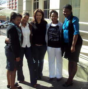 Shineen Brown (Broadband Sales Manager) with the young ladies from LEAP Science & Maths School
